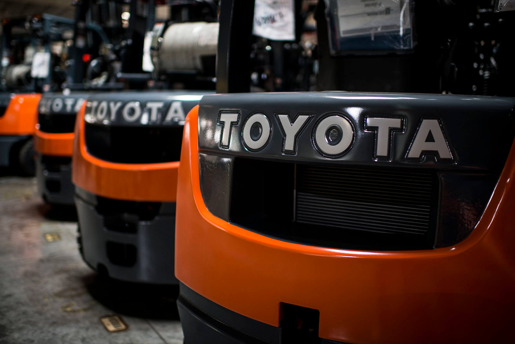  A group of LPG fuel storage powered Toyota Forklifts stored in a warehouse. This new generation of Toyota lift truck uses a mixer instead of carburetor to mix air and fuel
