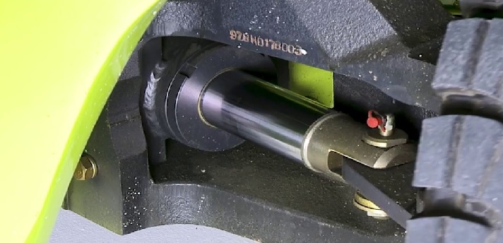 Clark forklift power steering cylinder attached to the vehicle's rear wheels