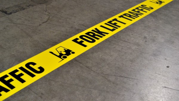 An image of a floor marking tape warning about forklift traffic