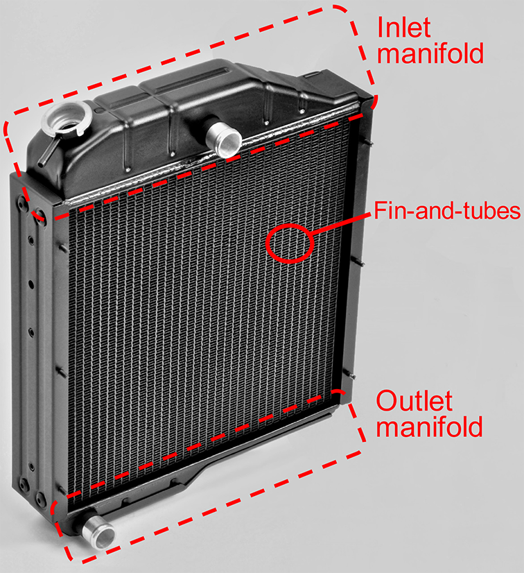 The body of a Komatsu radiator where its main three sections are highlighted